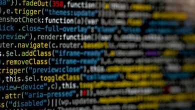 yellow and blue data code displayed on screen