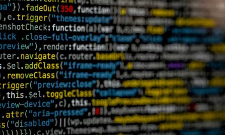 yellow and blue data code displayed on screen