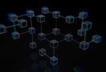 a group of cubes that are on a black surface