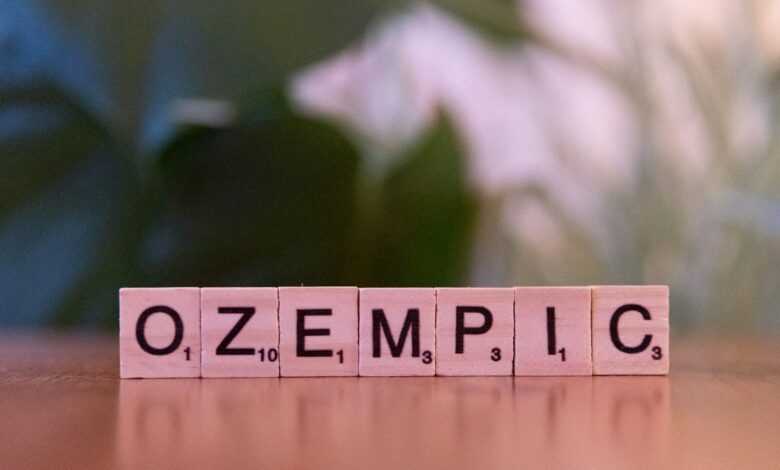 A close up of a scrabble type word on a table